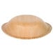 A close-up of a TreeVive by EcoChoice palm leaf bowl.