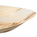 An EcoChoice oval palm leaf salad tray.