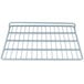 A close-up of a metal grid shelf for a refrigerator on a white background.