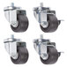 A set of four black rubber stem casters.