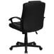 A black Flash Furniture office chair with arms and wheels.