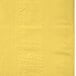 A Mimosa yellow table cover with a patterned border.
