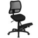 A Flash Furniture black kneeling office chair with a mesh back.