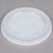 A translucent plastic Solo lid with straw slot and identification buttons.