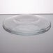 A Libbey clear glass salad plate with a circular edge.