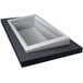 A white rectangular Hatco drop-in cold food well with a slanted glass window over three rectangular pans.