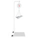 A white Cardinal Detecto hanging scale with a hook.