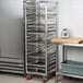 A Channel heavy-duty aluminum sheet pan rack holding metal trays.