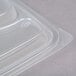 A close up of a clear plastic Genpak Smart-Set Pro lid on a clear plastic container.