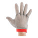 A hand wearing a San Jamar stainless steel mesh glove.
