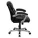 A black Flash Furniture office chair with chrome arms and base.