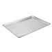 A Chicago Metallic full size bakery display tray on a white counter.