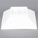 A white square porcelain bowl with a square bottom.