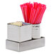 An American Metalcraft stainless steel holder holding sugar packets on a counter.