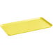 A yellow rectangular Cambro market tray.