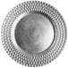 A close up of a silver Charge It by Jay plastic charger plate with a decorative border.