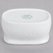 A white oval shaped porcelain dish with a logo on it.