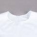 The back of a white Intedge cobbler apron over a gray surface.