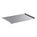 A stainless steel metal cover with a handle and holes.