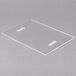 A clear plastic plate with white strips holding paper.