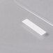 A white rectangular Cal-Mil U-Style rate card holder on a clear surface.