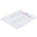 A white paper menu with red text in a Cal-Mil wall mount card holder.