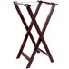 An American Metalcraft mahogany wood tray stand with two legs.