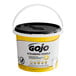 A white bucket of 2 cases of GOJO Scrubbing Towels.