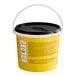 A yellow GOJO bucket with a black lid.