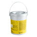 A white bucket with a yellow label.