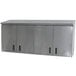 A stainless steel Advance Tabco wall cabinet with hinged doors.