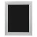 A satin aluminum snap frame with mitered corners on a white wall.
