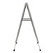 A white Aarco snap frame A-Frame sign with black legs.