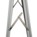 A close-up of a metal A-Frame sign with metal legs.