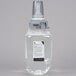 A close-up of a GOJO Clear & Mild hand soap bottle with a grey cap.
