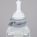A close up of a GOJO plastic bottle of hand soap with a white and grey cap.
