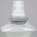 A plastic container of GOJO Green Certified foam hand soap with a cap on top.