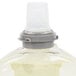 A plastic bottle of GOJO E2 foam hand soap with a grey plastic cap.