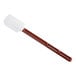 A white and brown Vollrath silicone spatula with a long handle.