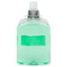 A close-up of a bottle of green liquid soap with a white background.