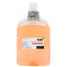 A plastic container of GOJO Luxury Orange Blossom foaming hand soap with a white label and a cap.