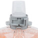 A close up of a plastic container of GOJO Luxury Orange Blossom Foaming Antibacterial Hand Soap with a plastic cap.