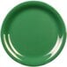 A close-up of a green plate with a white narrow rim.