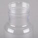 A Cal-Mil clear polycarbonate salad dressing bottle with a clear cap.