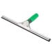 An Unger ErgoTec window squeegee with a green handle.