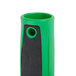 An Unger ErgoTec window squeegee with a green and black handle.