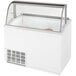 A white ice cream dipping cabinet with a glass top.