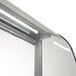 The glass door of a Turbo Air 47" Low Curved Glass Ice Cream Dipping Cabinet.