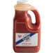 A jug of Crystal 1 gallon extra hot sauce.