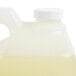 A white plastic jug of Micrell floral hand soap with a white plastic lid.